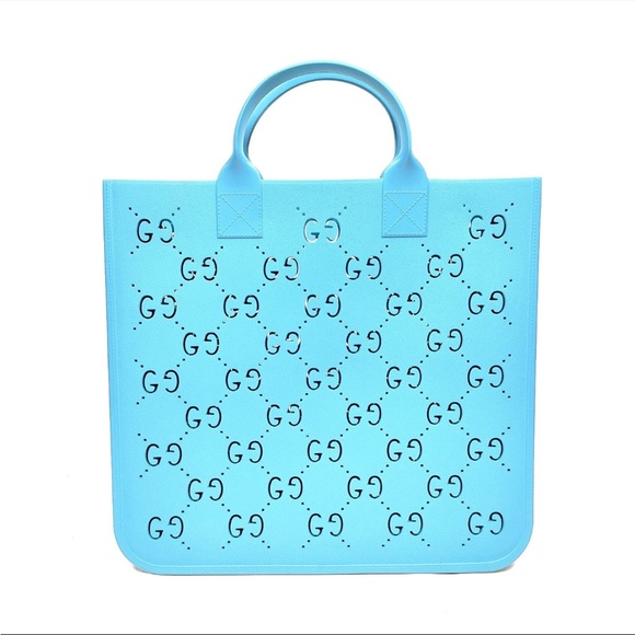 Gucci Handbags - Gucci Blue Perforated Rubber Tote Bag with COA EUC